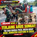 Terjang Arus Sungai, TNI dan Warga Pikul Mesin Berat Demi Jembatan Gantung di Sikka